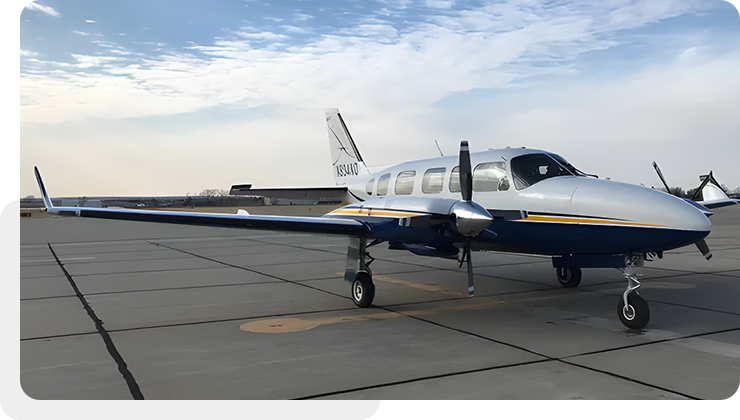 A small airplane sitting on top of an airport runway.