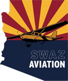 A small airplane flying over the state of arizona.